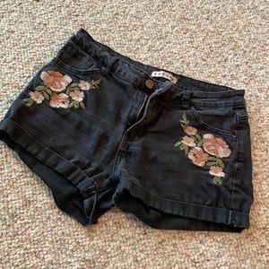 Black jean shorts with flowers